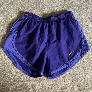 Purple Nike shorts